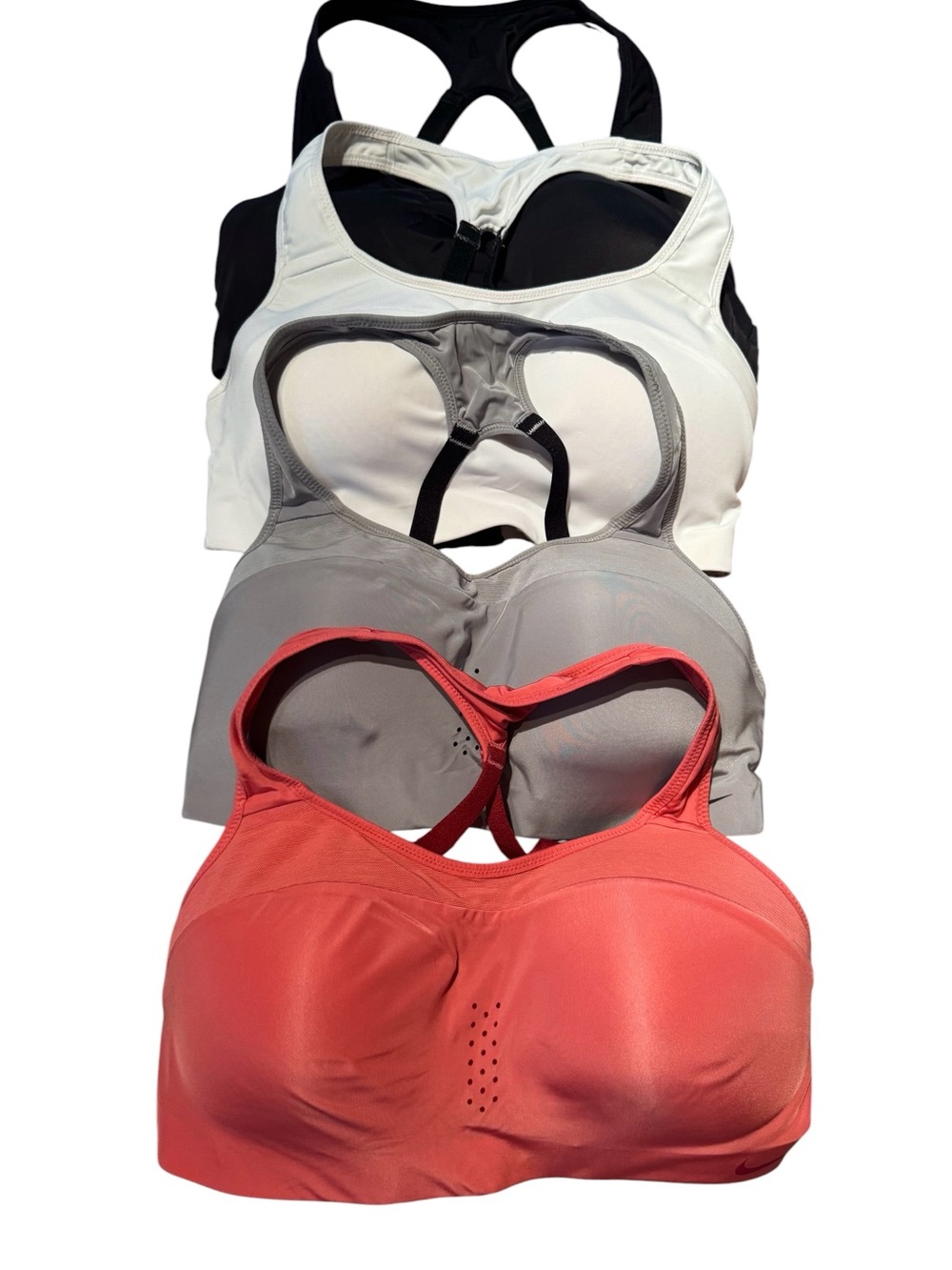Nike 4-Pack Racerback Sports Bras in Coral, Gray, White, and Black